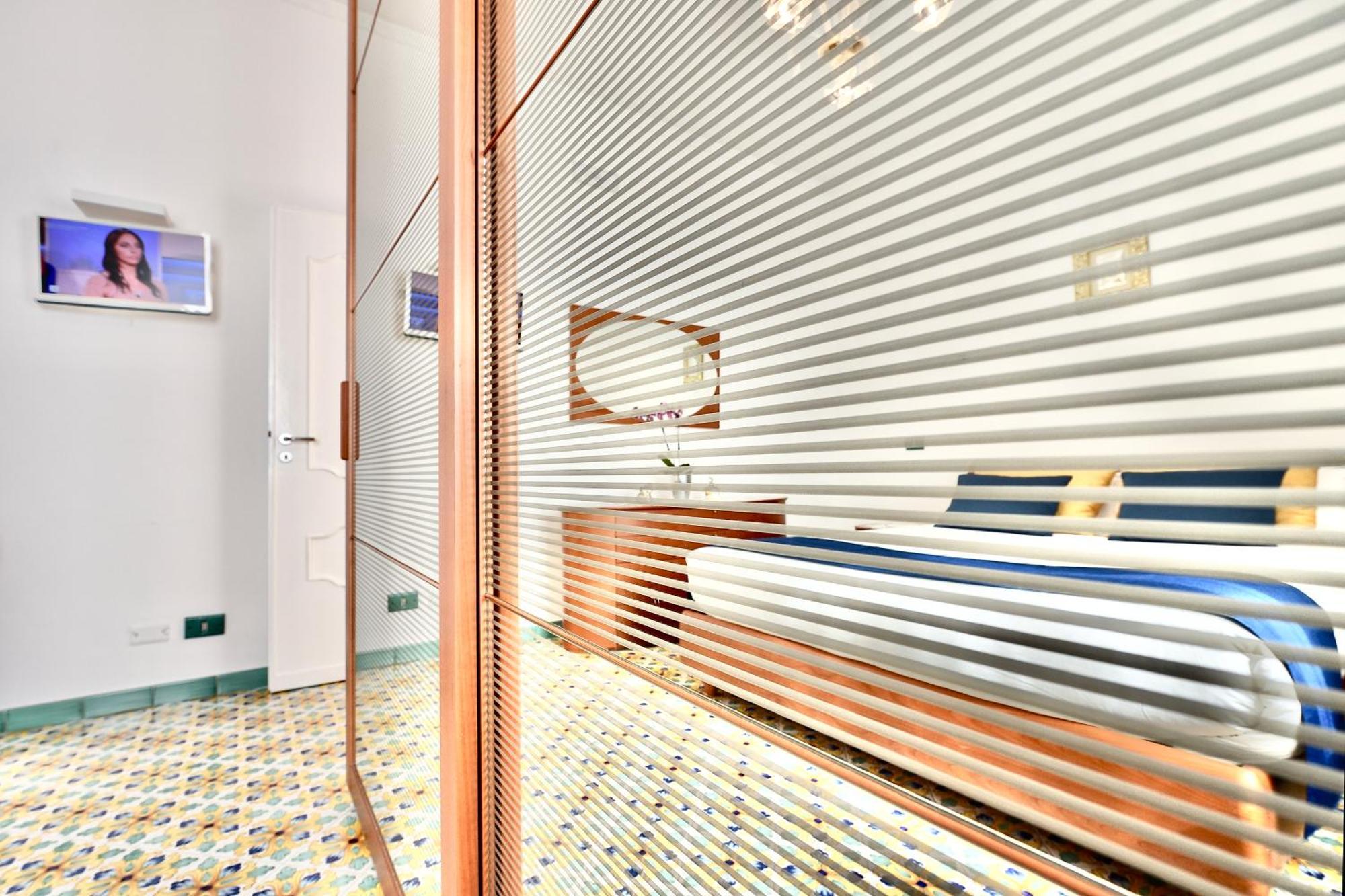 Smeraldo Holiday House Конка-дей-Марини Номер фото